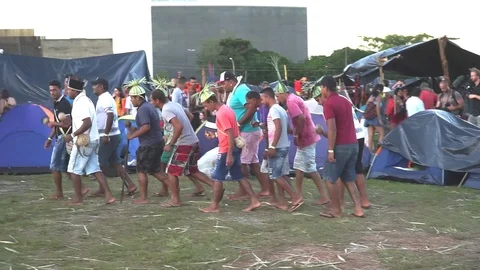 Thousands of Indigenous Indians descend upon the capital city of Brasilia Stock Footage 107162162