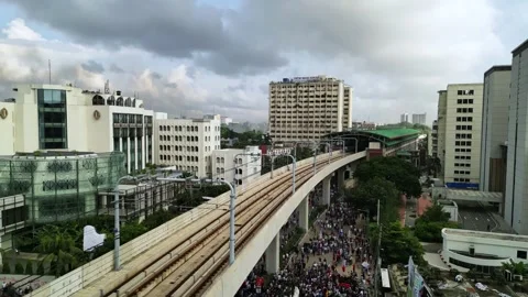 Thousands March in Dhaka Captured by Drone – August 5, 2024 Stock Footage 311881133