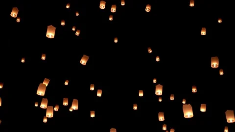 Thousands of Paper Lanterns Released into Night Sky Yi Peng Festival 스톡 동영상 337513520