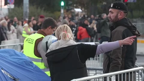 Thousands of people gathered in front of the Serbian Parliament in Belgrade, BEL Stock-Footage 320576759