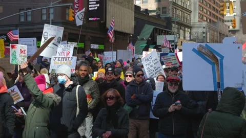 Thousands of people march in NYC during the "No Kings" national day of action Stock Footage 332951432
