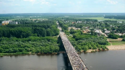 Thousands of pilgrims are moving on the bridge Stock Footage 73818007