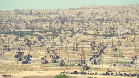 Thousands of pumpjack pumping in oil field, Bakersfield, California Stock Footage 86133277