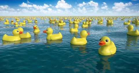 Thousands of rubber ducks in the ocean, 3D animation Stock Footage 125680233