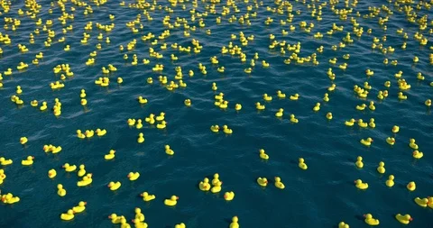 Thousands of rubber ducks in the ocean, 3D animation Stock Footage 125680797