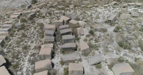 Thousands of stone blocks from abandoned quarry from the air Stock Footage 210232660