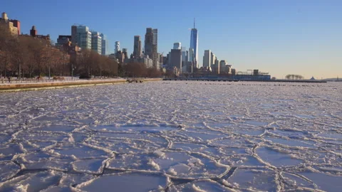 Thousands of Unique shape of ice floes wrap up the Hudson River Stock Footage 336697093