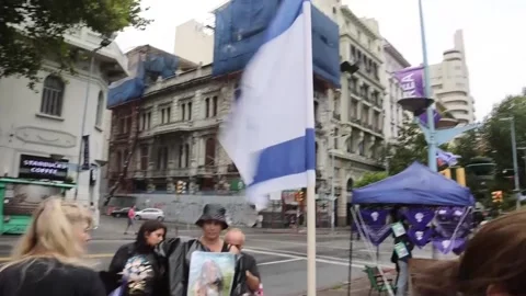 Thousands of Uruguayans demand gender equality on Women's Day, Montevideo, UY -  Stock Footage 303737673