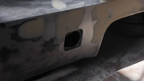 Thr car is in the process of repair. Stock Footage 118023819