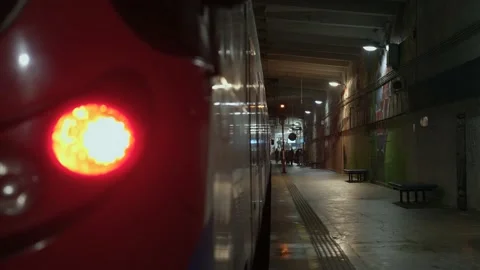 Thrain on the abandoned railway / subway platform. Gotham city mood. Cinematic Stock Footage 220057535