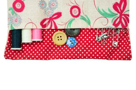 Thread and button in sewing kit bag isolated on white background Stock Photos