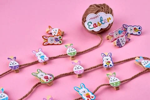 Thread and funny easter bunnies. Stock Photos