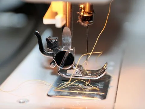 Thread and needle Stock Photos