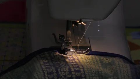 The thread and needle working on sewing machine and stitching Stock Footage 112855057