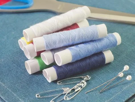 Thread and scissors Stock Photos