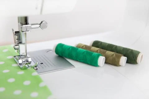Thread and sewing machine Stock Photos