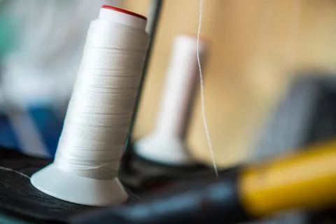 Thread and sewing machine Stock Photos