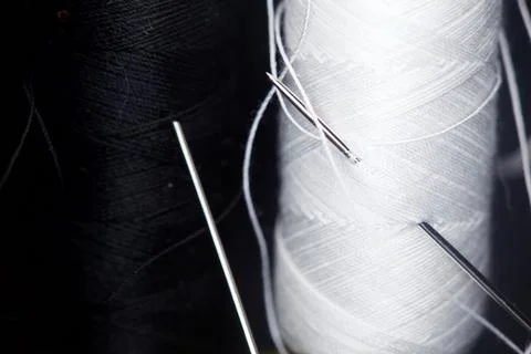 Thread on a black background Stock Photos
