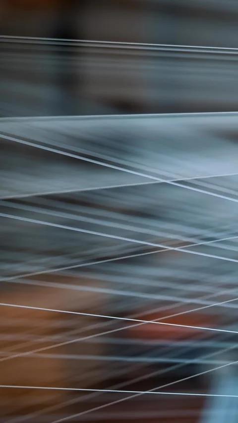Thread. close-up. abstract drawings made from stretched threads in the light. Stock Footage 316892198