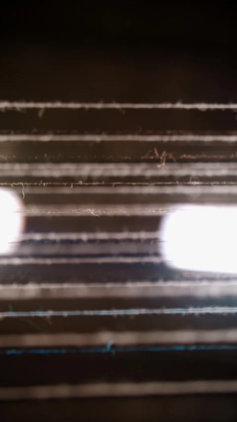 Thread. close-up. dyeing and drying of threads for further fabric production by Stock Footage 318247839