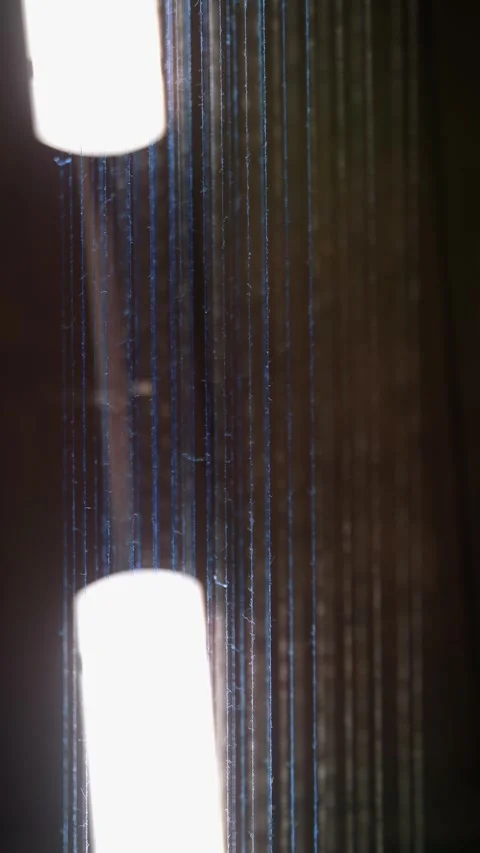 Thread. close-up. dyeing and drying of threads for further fabric production by Stock Footage 319901096