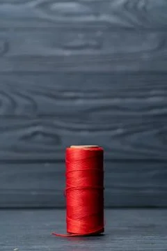 Thread coils black red and blue Stock Photos