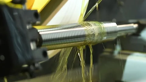 Thread cutting with oil lubrication. CNC machine metalworking. Stock Footage 91109201
