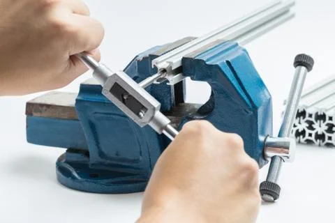 Thread cutting with a vise and taps Stock Photos