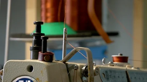 Thread detail moving in sewing machine Stock Footage 118135944