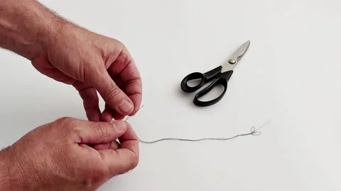 Thread Knot Mastery: Quick Secure Sewing Guide 스톡 동영상 310822875