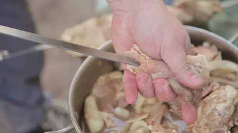 Thread on meat on a skewer Stock Footage 62175015