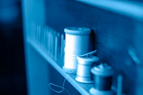 Thread needle button Stock Photos