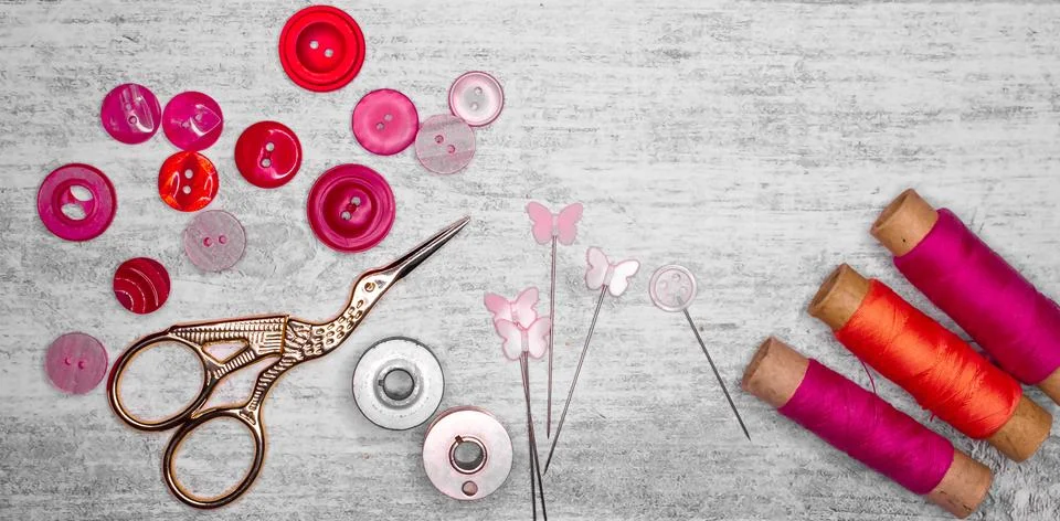 Thread needles scissors buttons Stock Photos