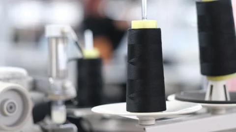 Thread roll spinning at a textile factory Stock Footage 247985189