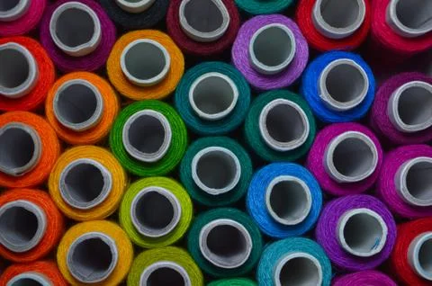 Thread rolls forming a colourful  pattern 写真素材