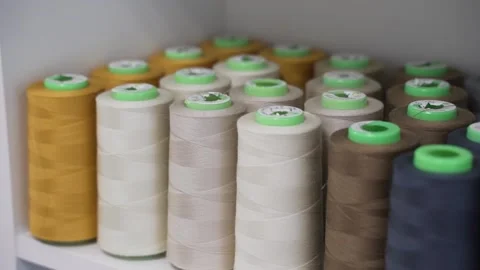 Thread for sewing of different colors close-up Stock Footage 135829087