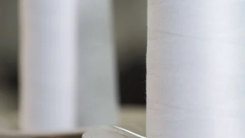 Thread a sewing factory, close-up Stock Footage 128448339