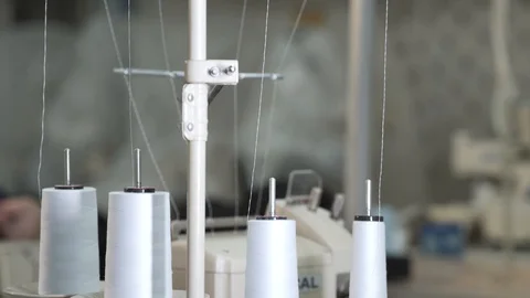 Thread a sewing factory, close-up Stock Footage 128448454