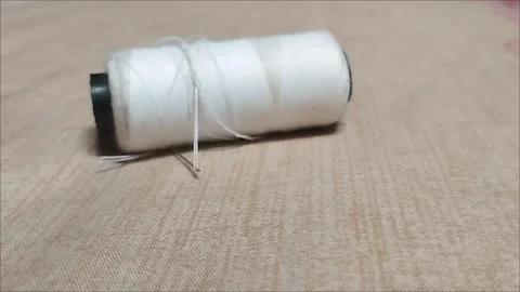 Thread for sewing white clothes Stock Footage 293115515