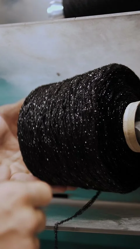 Thread spool. close-up. textile industry. thread coloring machine. Textile Stock Footage 318462876