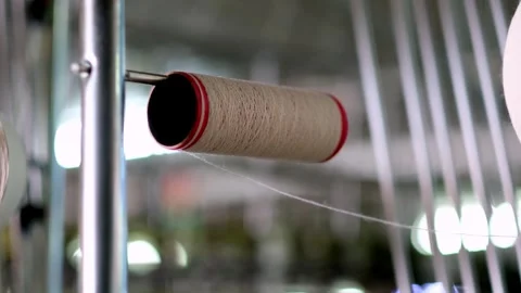 Thread Spool Detail in Textile Factory Stock Footage 329766658