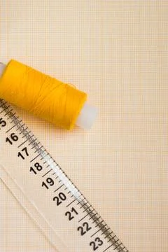 Thread in spools and cutter line for sewing Stock Photos