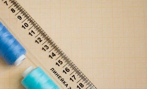 Thread in spools and cutter line for sewing Stock Photos