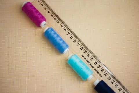 Thread in spools and cutter line for sewing Stock Photos