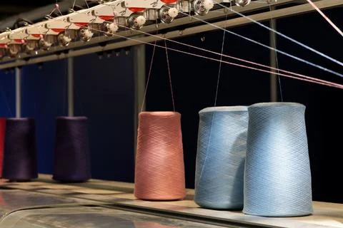 Thread spools and manufacturing equipment Stock Photos