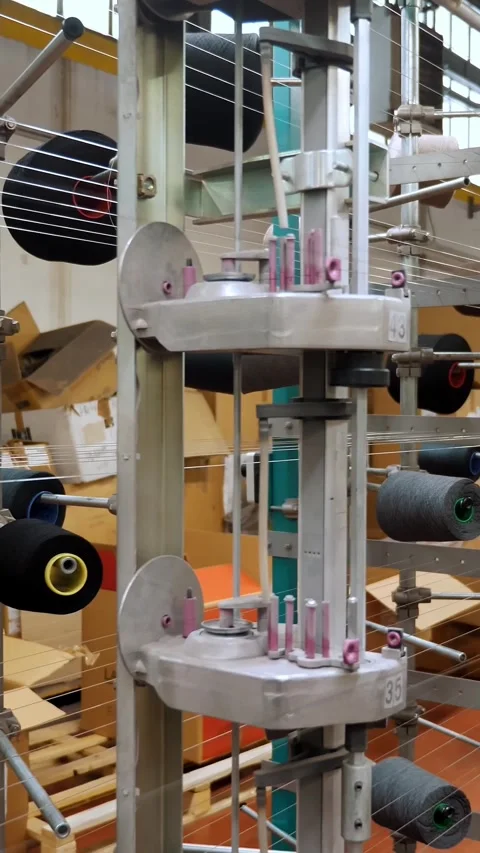 Thread spools. textile industry. weaving factory. racks with many thread spools. Stock Footage 319390296