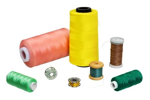 Thread spools on white Stock Photos