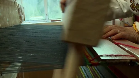 Thread threaded into the needle loom Stock Footage 71573667