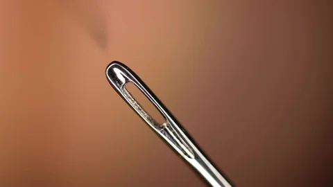 Thread Through The Eye Of A Needle Macro Видео 104119818