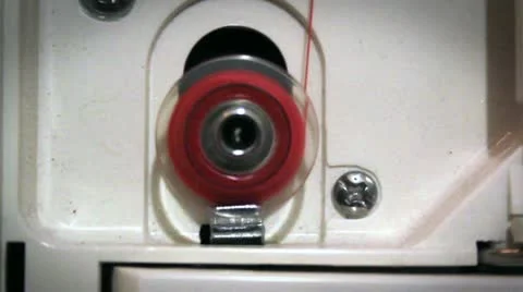 Thread wound on the bobbin in the sewing machine Stock Footage 14808519